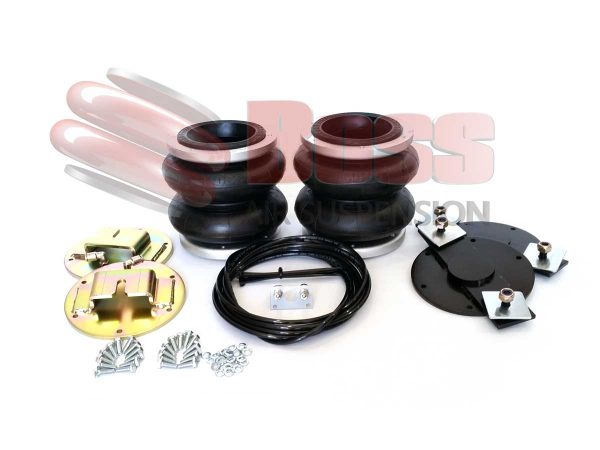 A set of shock absorbers and hardware for a Ford Transit car.