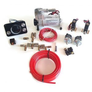 A car air conditioning system with hoses and wires, integrated with Ford F250-350 Airbag Suspension - Boss.