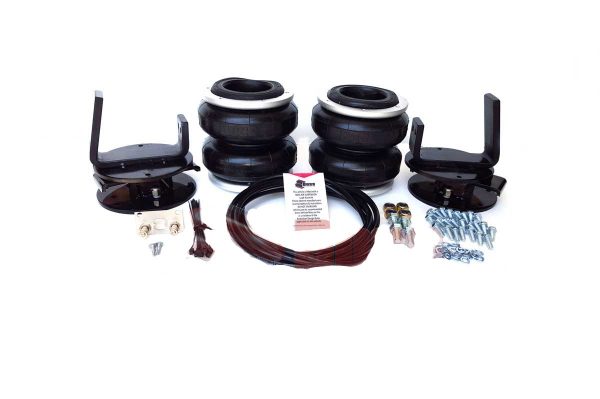 A Toyota Hilux 4X4 Airbag Suspension - Boss kit for a car with a tire and bolts.