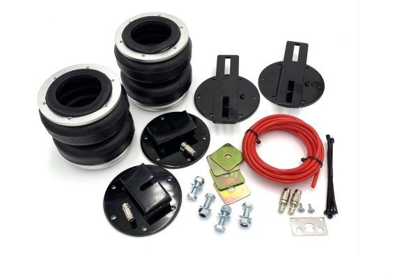 A set of Renault Master Airbag Suspension - Boss shocks and hoses for a car with airbag suspension.