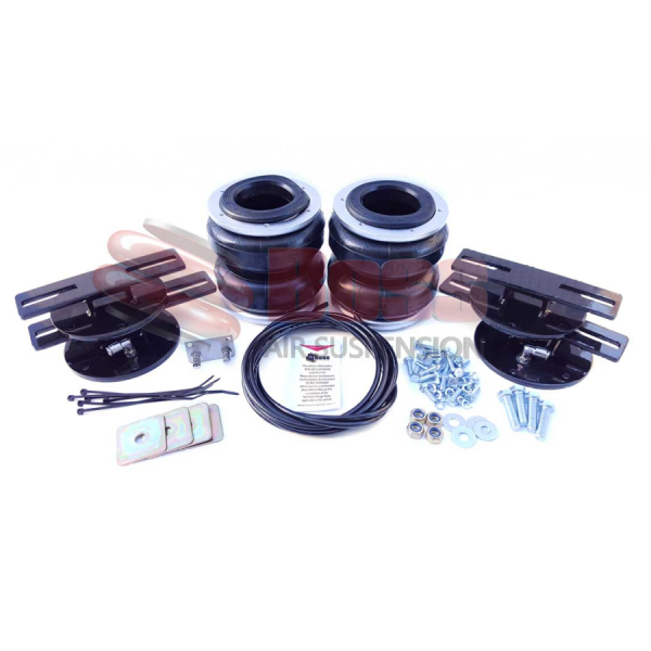 A Nissan Patrol 4WD Coil Assist and Replacement - Boss suspension kit with bolts, nuts, and coils.