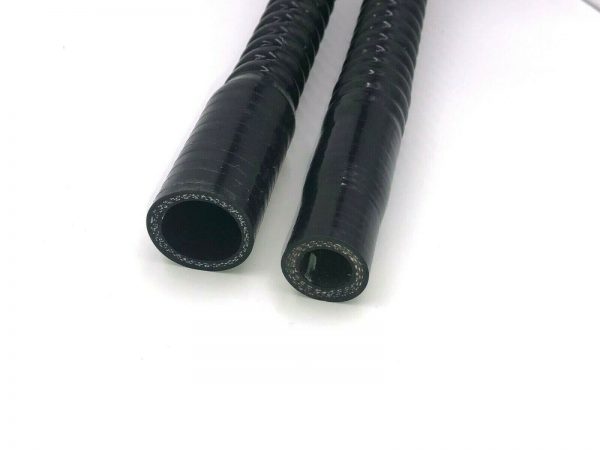 Two black hoses from the PVH Long Length Provent 200 Hose Kit on a white surface.